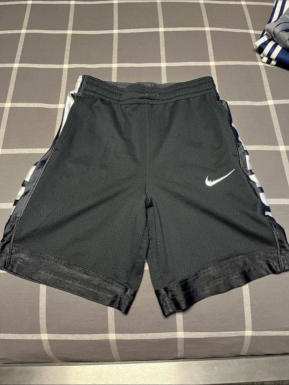 Nike Black Athletic Basketball Shorts with White Swoosh